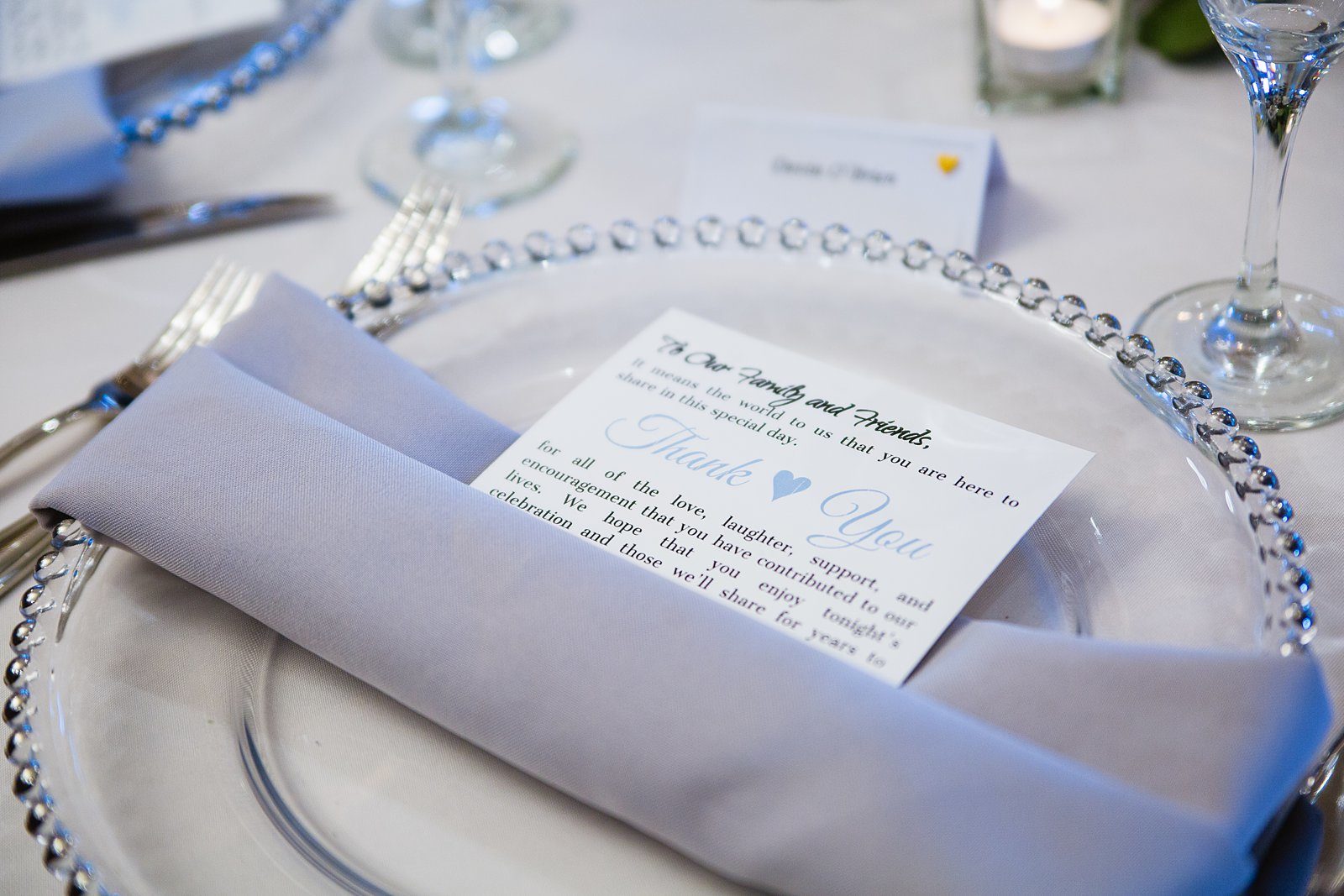 Grey and blue wedding reception place setting by PMA Photography.