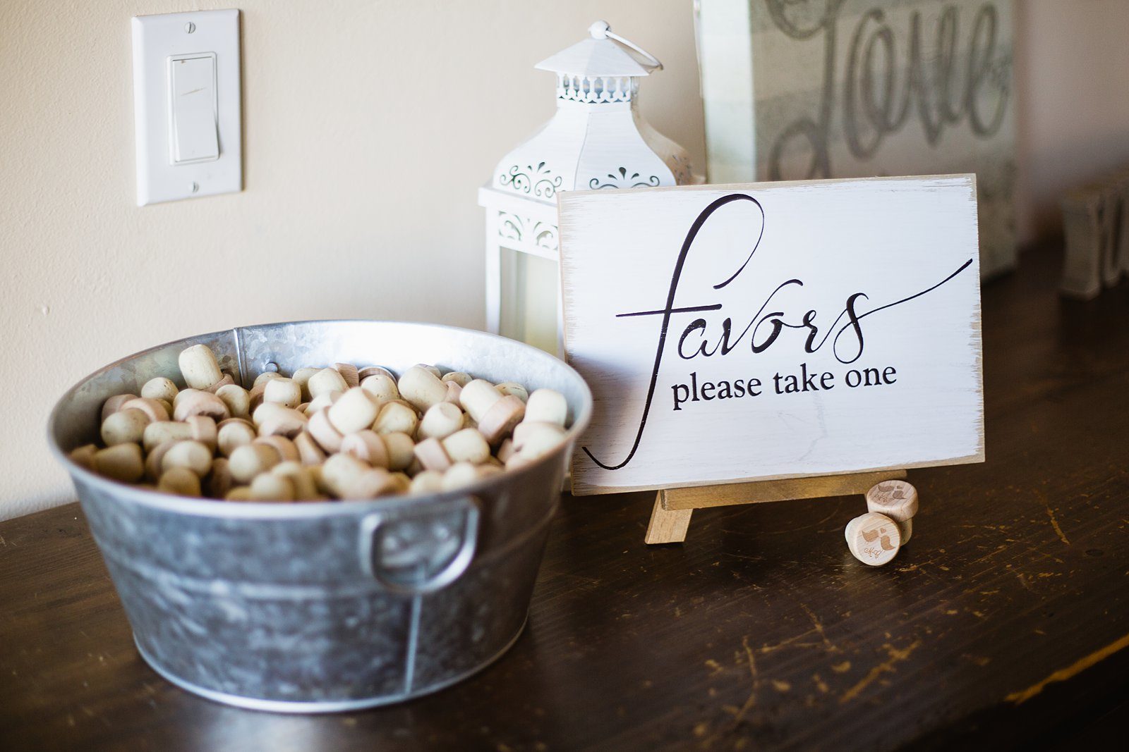 Wine cork favors personalized with the couple's names and wedding date by PMA Photography.