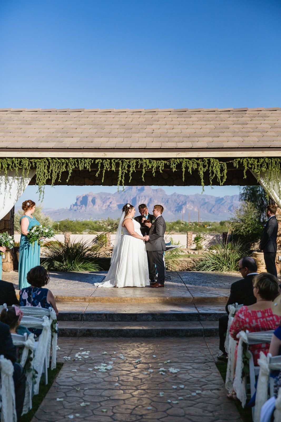 Wedding ceremony at Superstition Manor by Arizona wedding photographer PMA Photography.