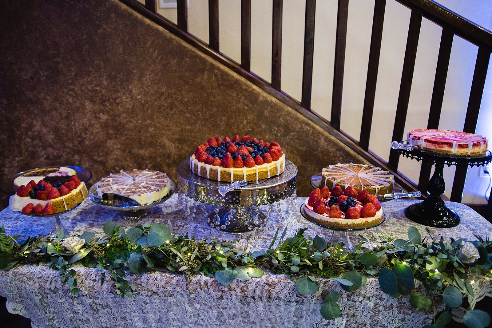 Assorted cheesecake table as a wedding cake alternative by PMA Photography.