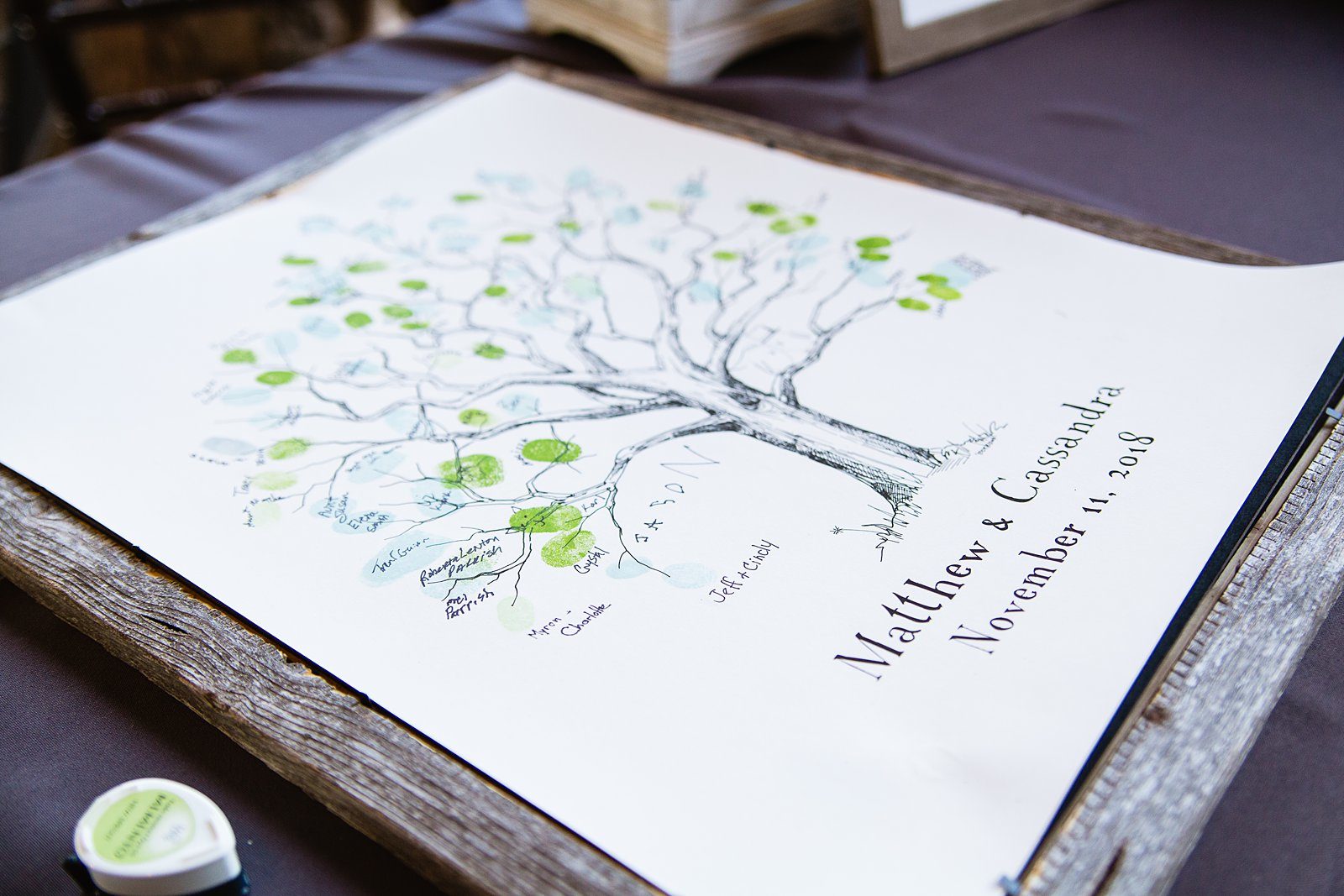Fingerprint tree wedding guest book by PMA Photography.
