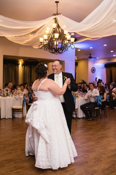 Bride dancing with her father during the father daughter dance by PMA Photography.