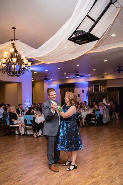 Groom dancing with his mother during the mother son dance by PMA Photography.