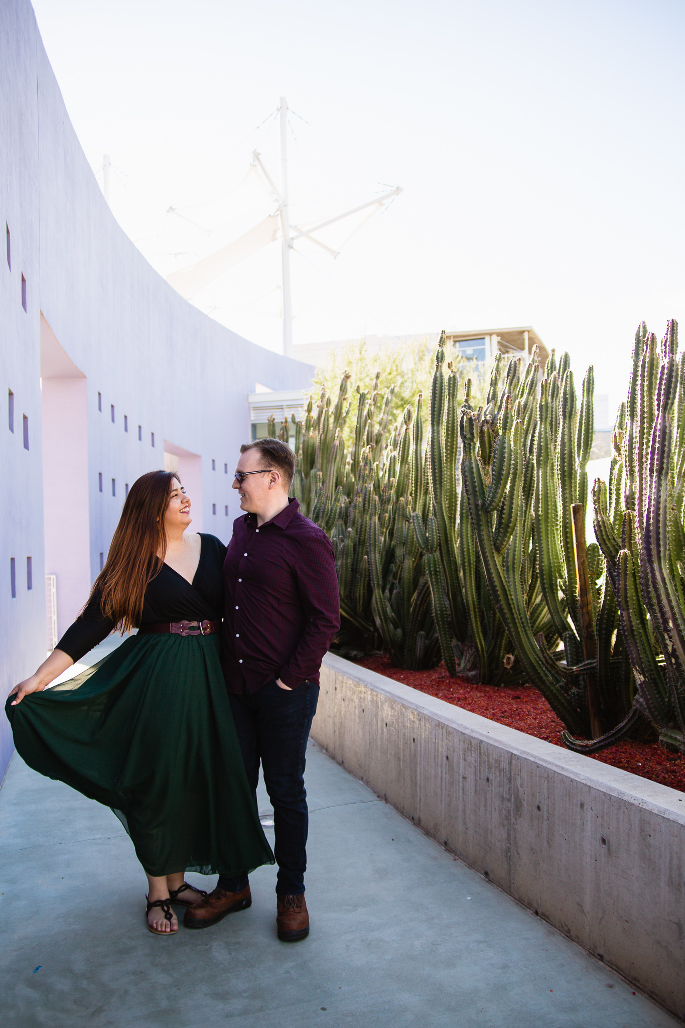 Couple pose for their Mesa Arts Center engagement session by Mesa wedding photographer PMA Photography.