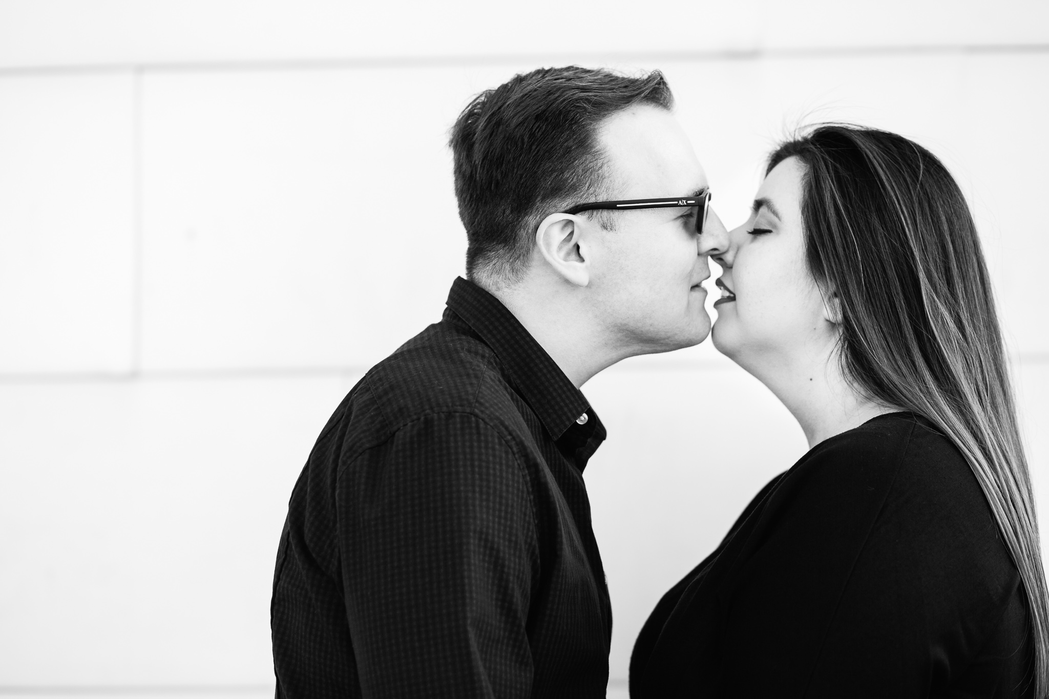 Couple share an intimate moment during their Mesa Arts Center engagement session by Mesa engagement photographer PMA Photography.