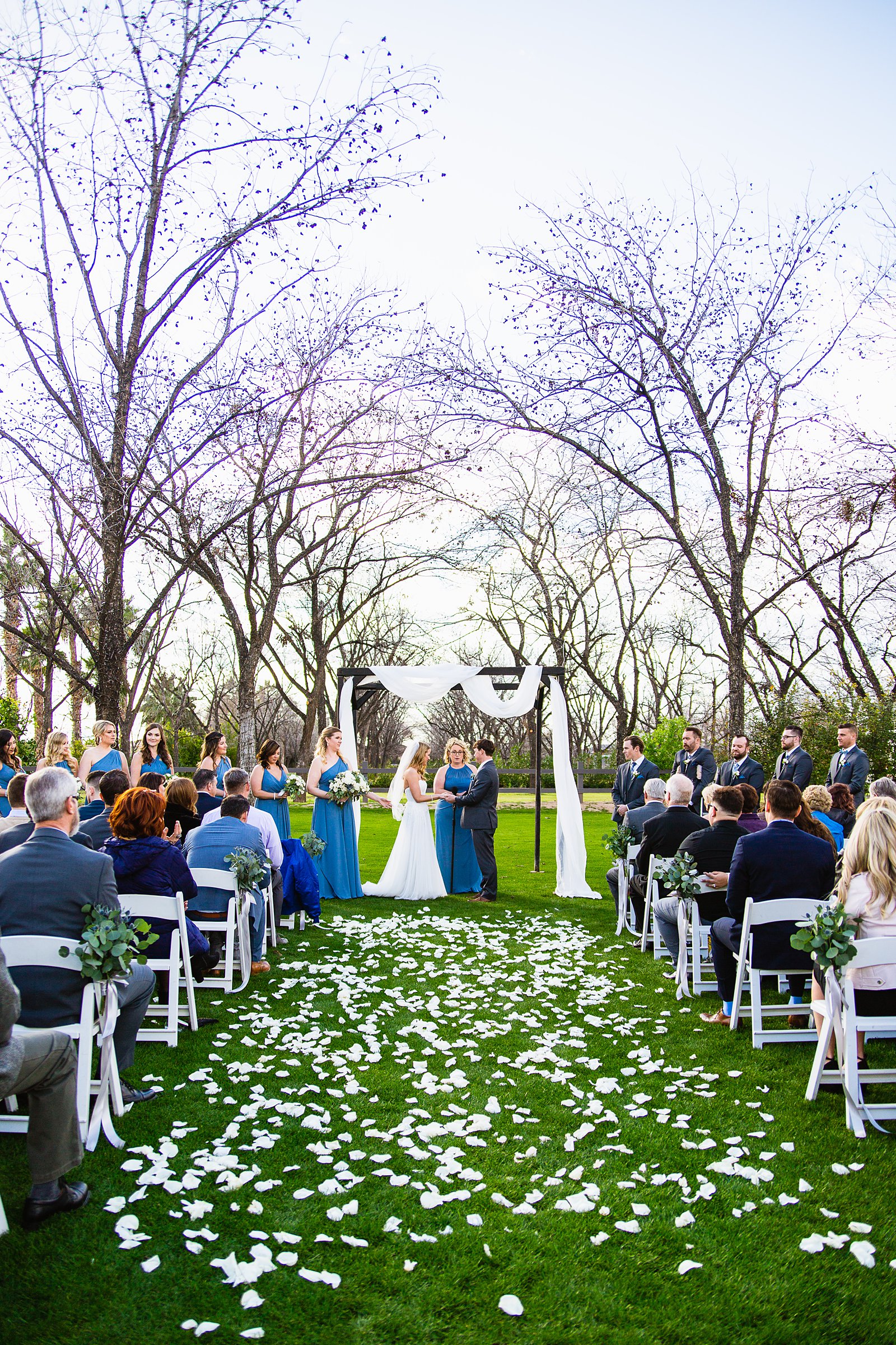 Wedding ceremony at Venue At The Grove by Arizona wedding photographer PMA Photography.