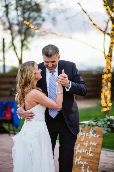 Bride dancing with her father at Venue at the Grove wedding reception by Phoenix wedding photographer PMA Photography.
