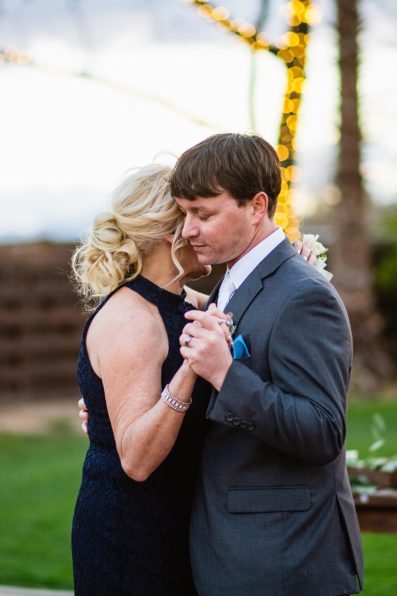 Groom dancing with his mother at Venue at the Grove wedding reception by Arizona wedding photographer PMA Photography.