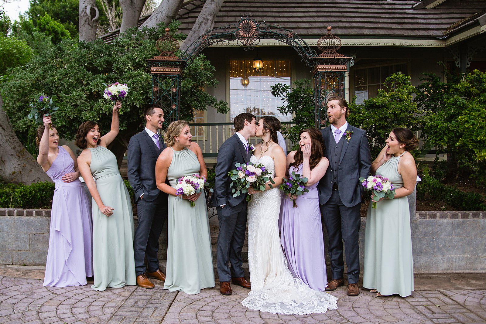Mixed gender party having fun together at The Wright House weding by Arizona wedding photographer PMA Photography.