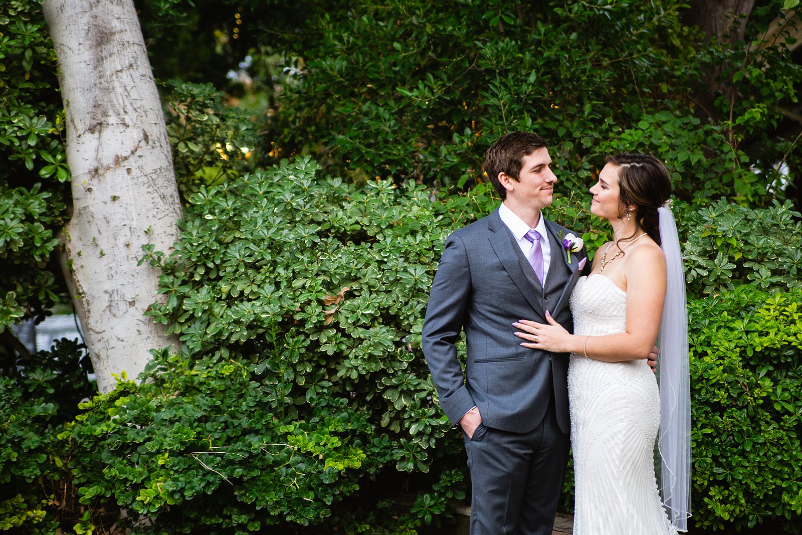 Bride and Groom pose during their The Wright House wedding by Arizona wedding photographer PMA Photography.