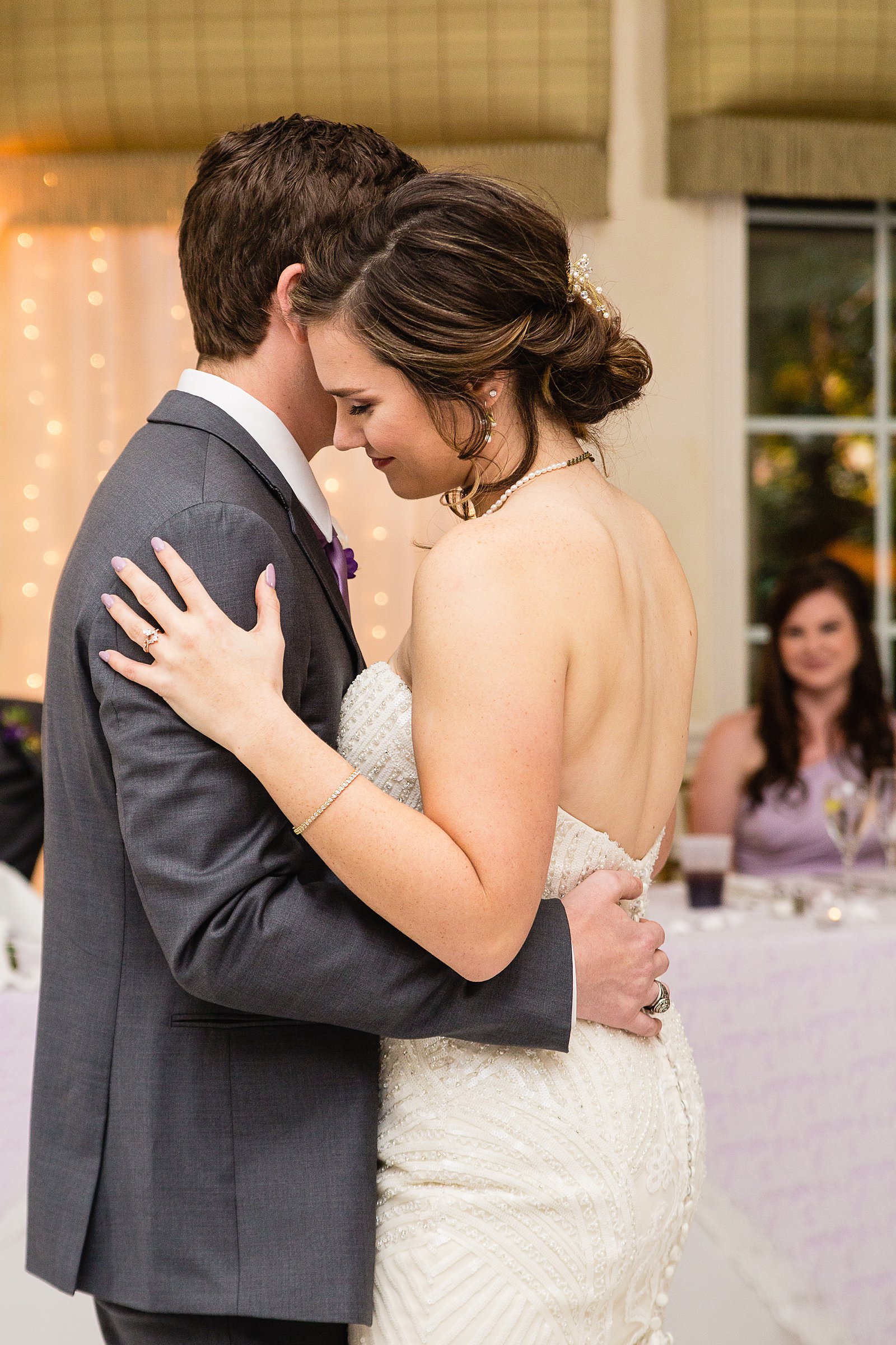 Bride and Groom sharing first dance at their The Wright House wedding reception by Arizona wedding photographer PMA Photography.