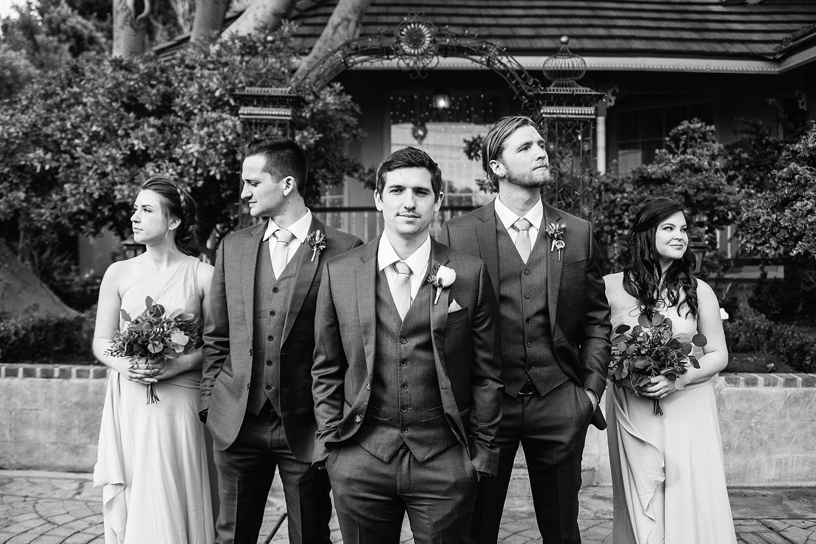 Groom and mixed gender bridal party together at a The Wright House wedding by Arizona wedding photographer PMA Photography.