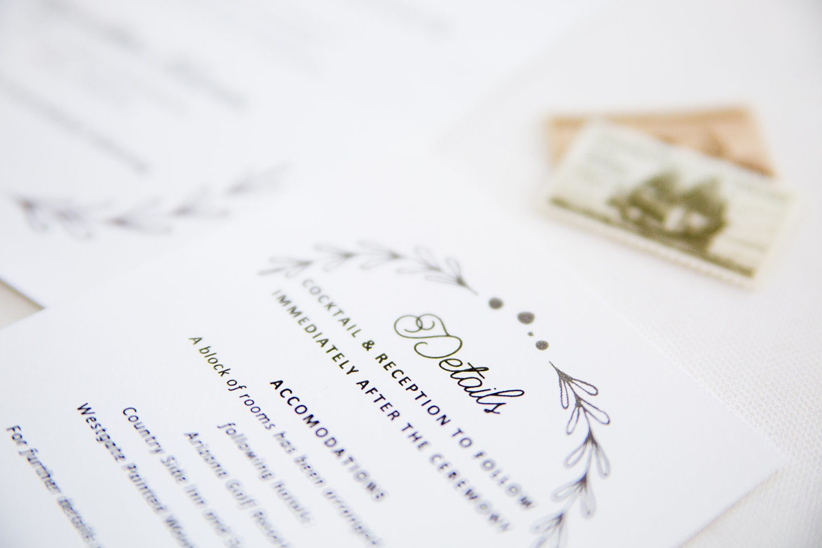 Simple and romantic botanical inspired wedding invitations by PMA Photography.