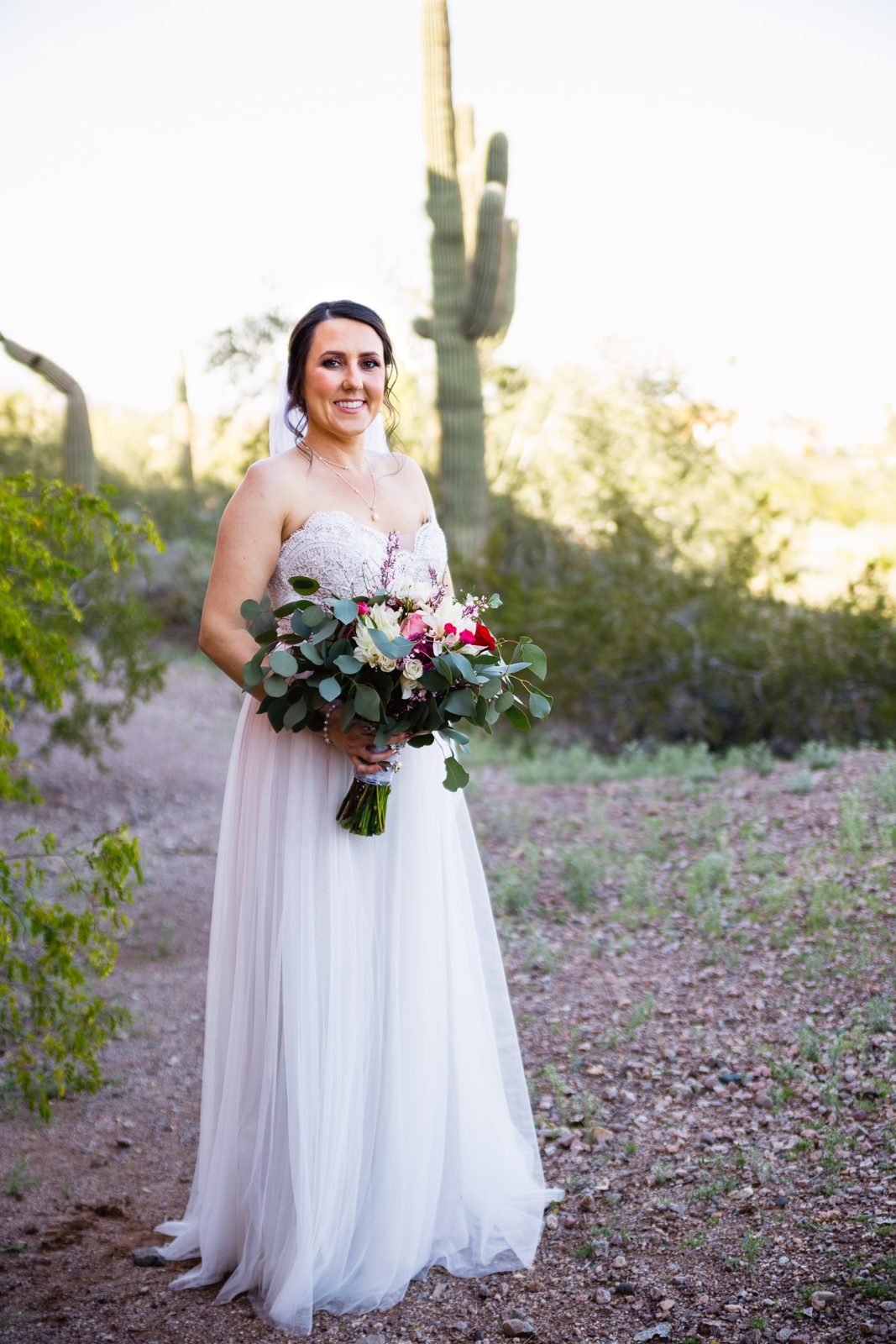 Bride's grey romantic wedding dress for her Arizona Heritage Center at Papago Park wedding by PMA Photography.