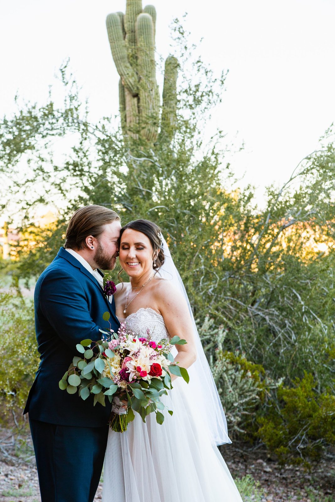 Bride and Groom share an intimate moment at their Arizona Heritage Center at Papago Park wedding by Arizona wedding photographer PMA Photography.