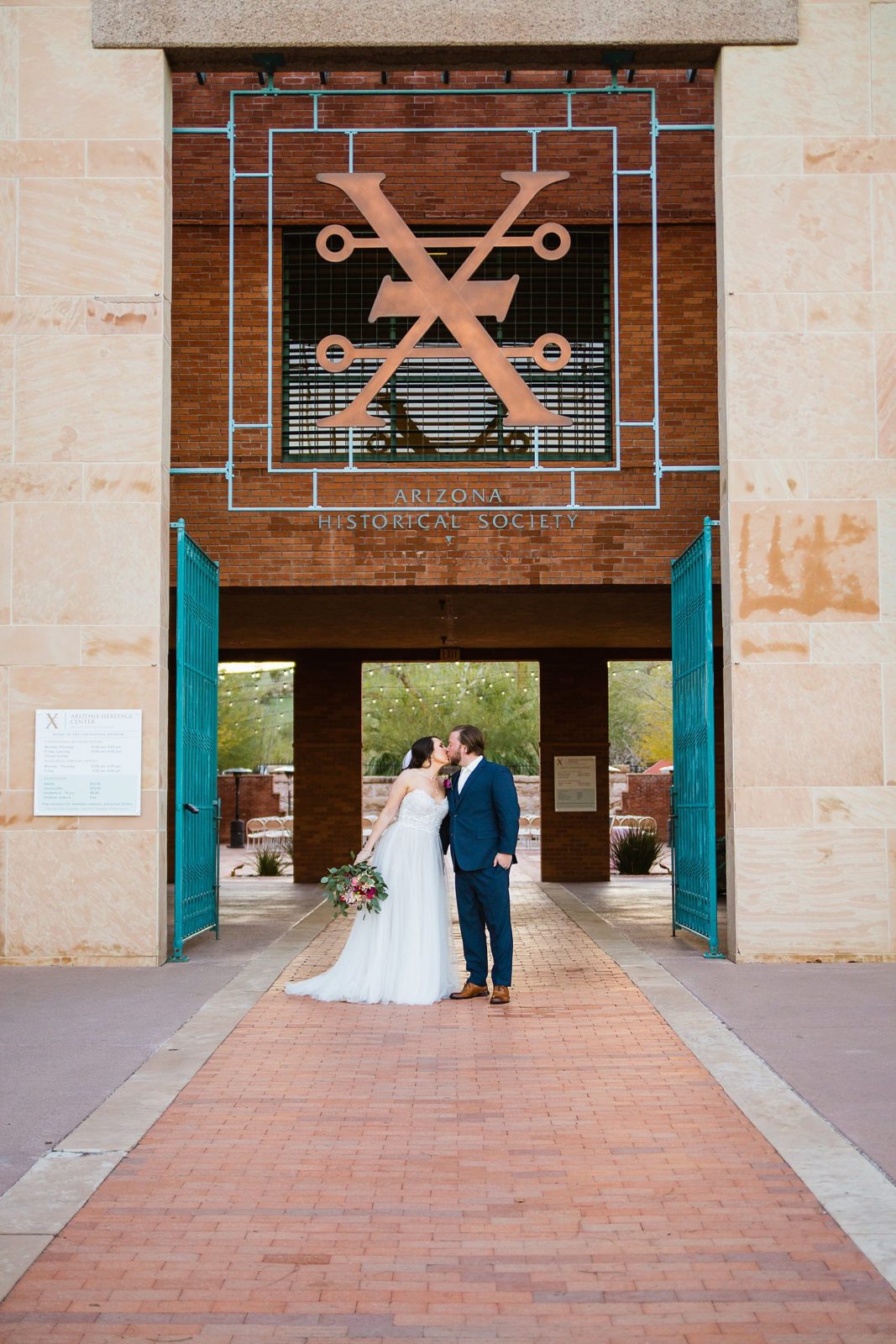 Bride and Groom pose during their Arizona Heritage Center at Papago Park wedding by Arizona wedding photographer PMA Photography.