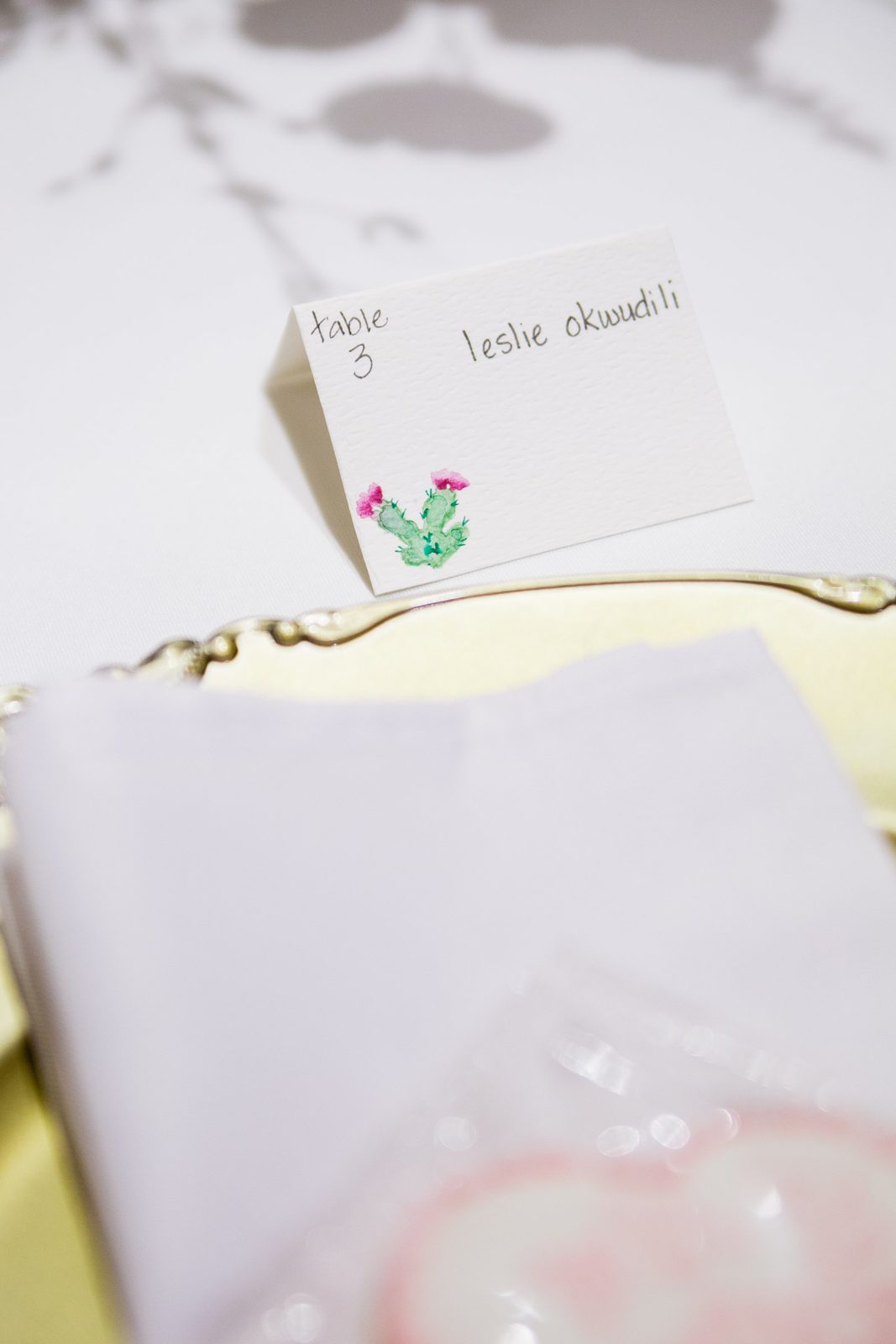 Hand painted watercolor prickly pear place cards at Arizona Heritage Center at Papago Park wedding reception by Temepe wedding photographer PMA Photography.
