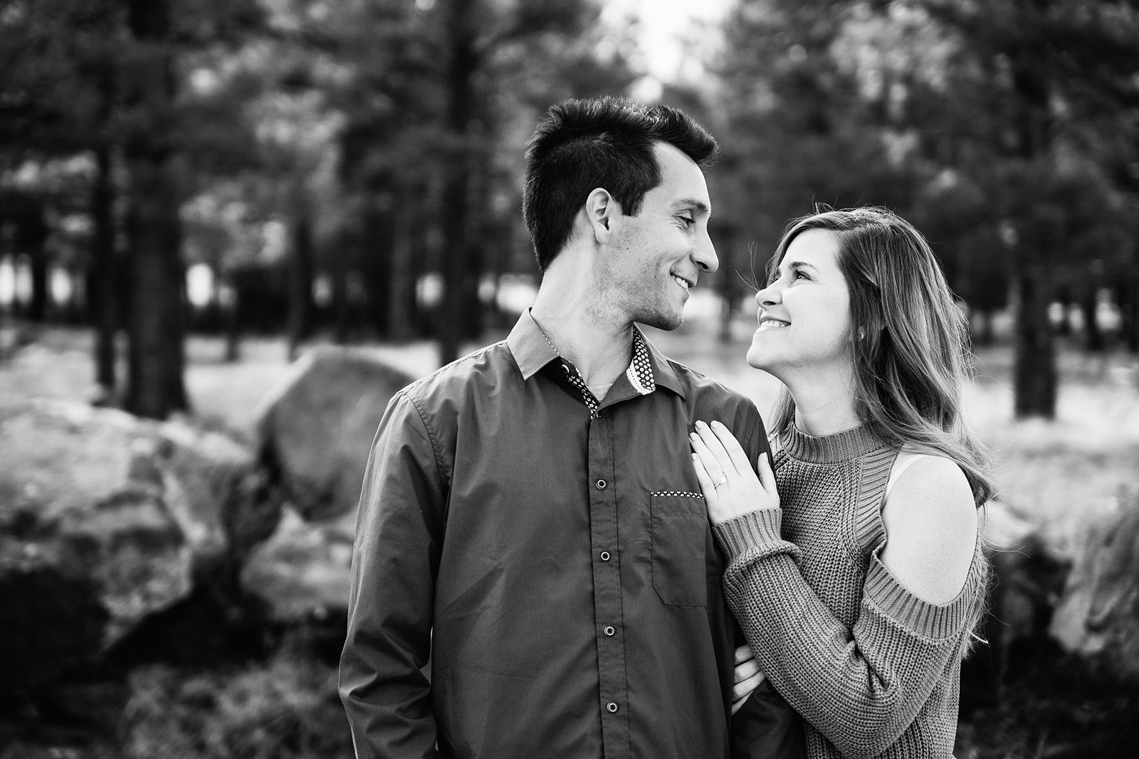Couple share an intimate moment during their Buffalo Park engagement session by Flagstaff engagement photographer PMA Photography.