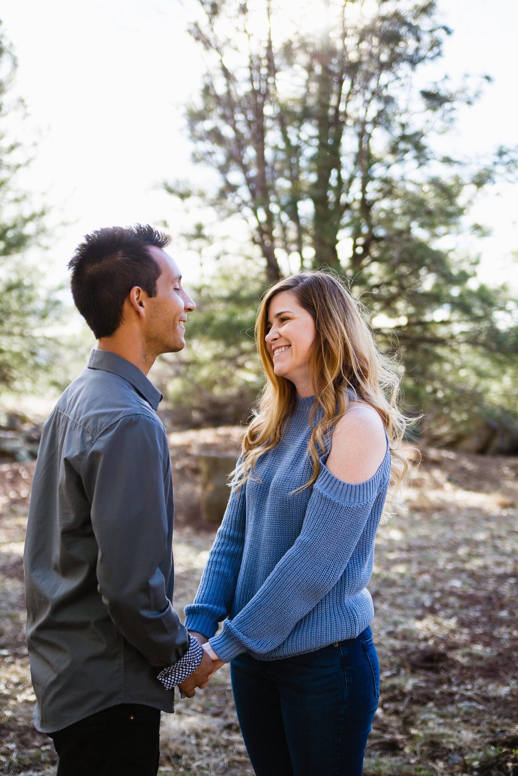 Couple share an intimate moment at their Flagstaff engagement session by Arizona engagement photographer PMA Photography.
