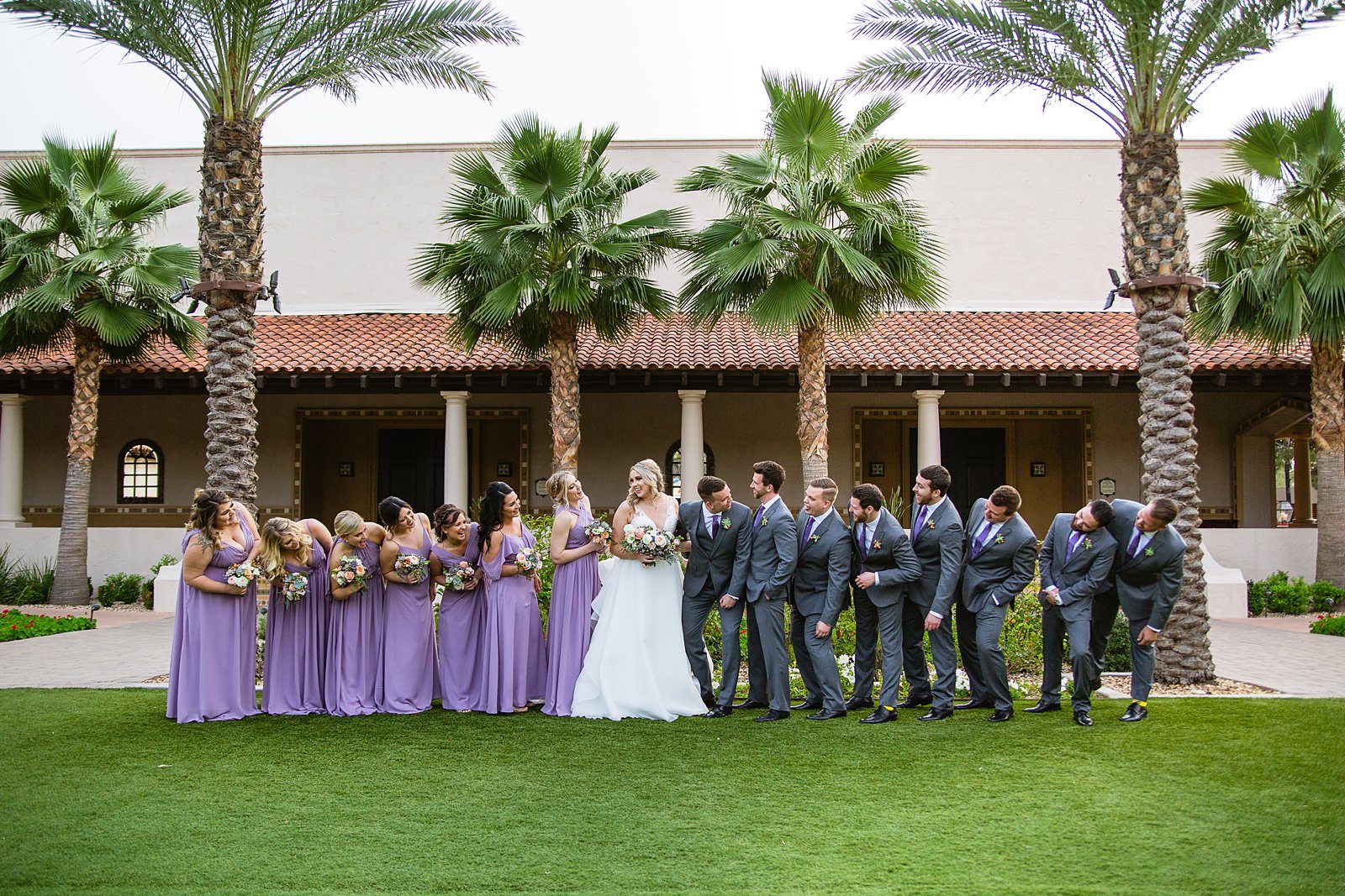 Bridal party laughing together at The Scottsdale Resort at McCormick Ranch wedding by Scottsdale wedding photographer PMA Photography.