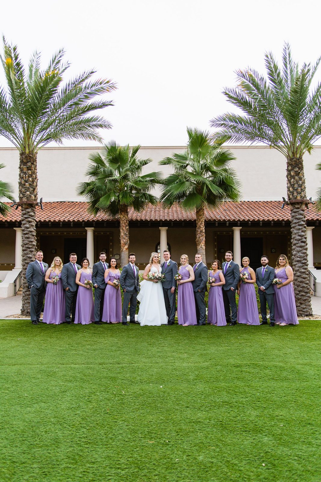Bridal party together at a The Scottsdale Resort at McCormick Ranch wedding by Arizona wedding photographer PMA Photography.