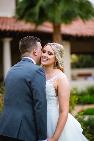Bride and Groom share an intimate moment during their The Scottsdale Resort at McCormick Ranch wedding by Scottsdale wedding photographer PMA Photography.