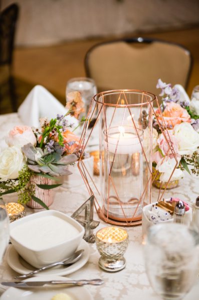 Romantic rose gold candle geometric centerpieces at The Scottsdale Resort at McCormick Ranch wedding reception by Scottsdale wedding photographer PMA Photography.