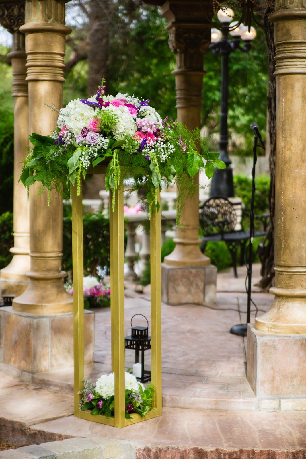Wedding ceremony floral decor at a garden wedding at The Wright House Provencal by PMA Photography.