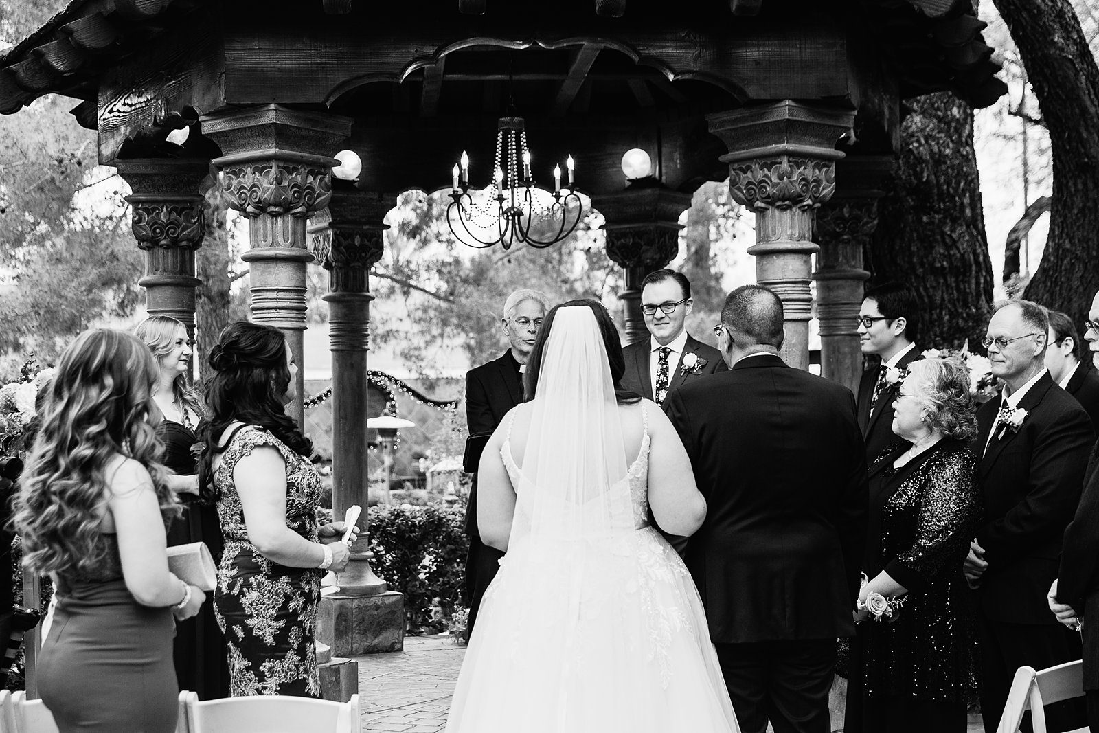 Groom as the bride walks down the aisle by PMA Photography.