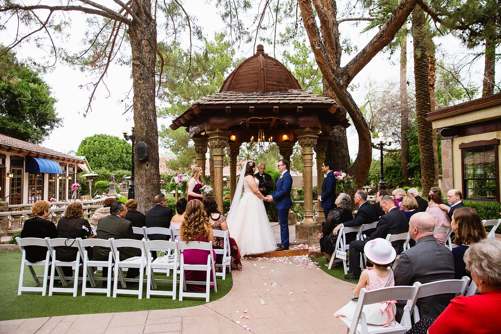 Wedding ceremony at The Wright House Provencal by Arizona wedding photographer PMA Photography.