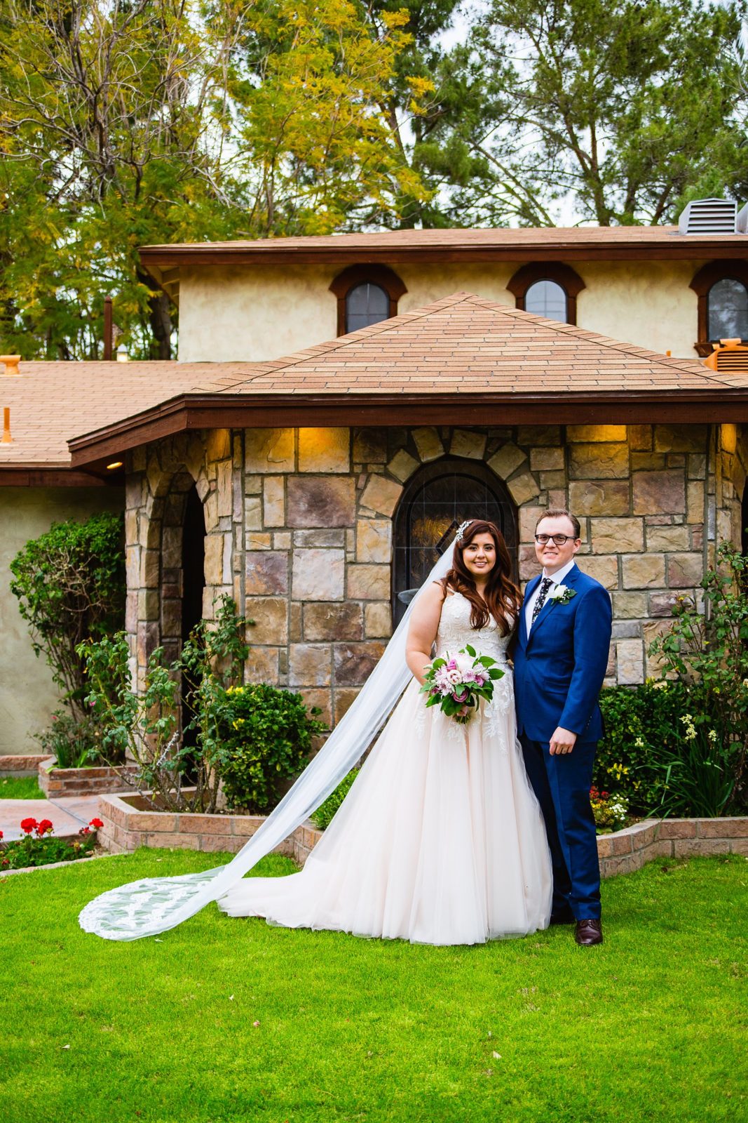Bride and Groom pose during their The Wright House Provencal wedding by Arizona wedding photographer PMA Photography.