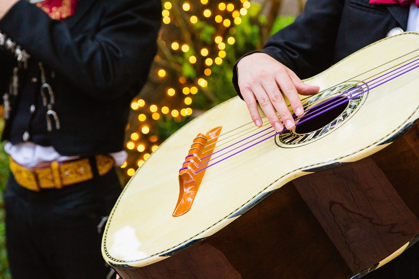 Mariachi band playing for guests during cocktail hour at a Wright House Provencal wedding by Arizona wedding photographer PMA Photography.