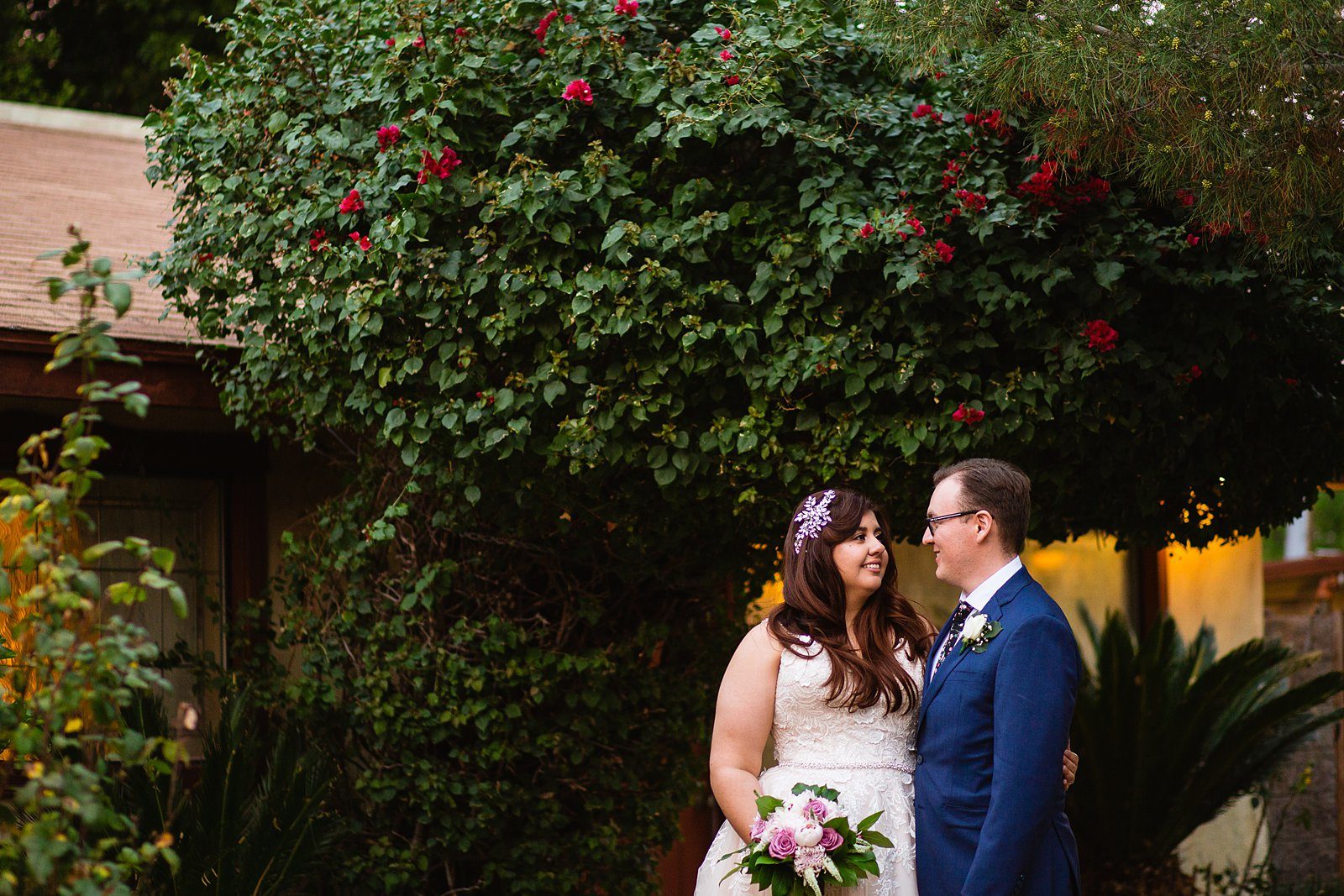 Bride and Groom pose for their Wright House Provencal wedding by Mesa wedding photographer PMA Photography.