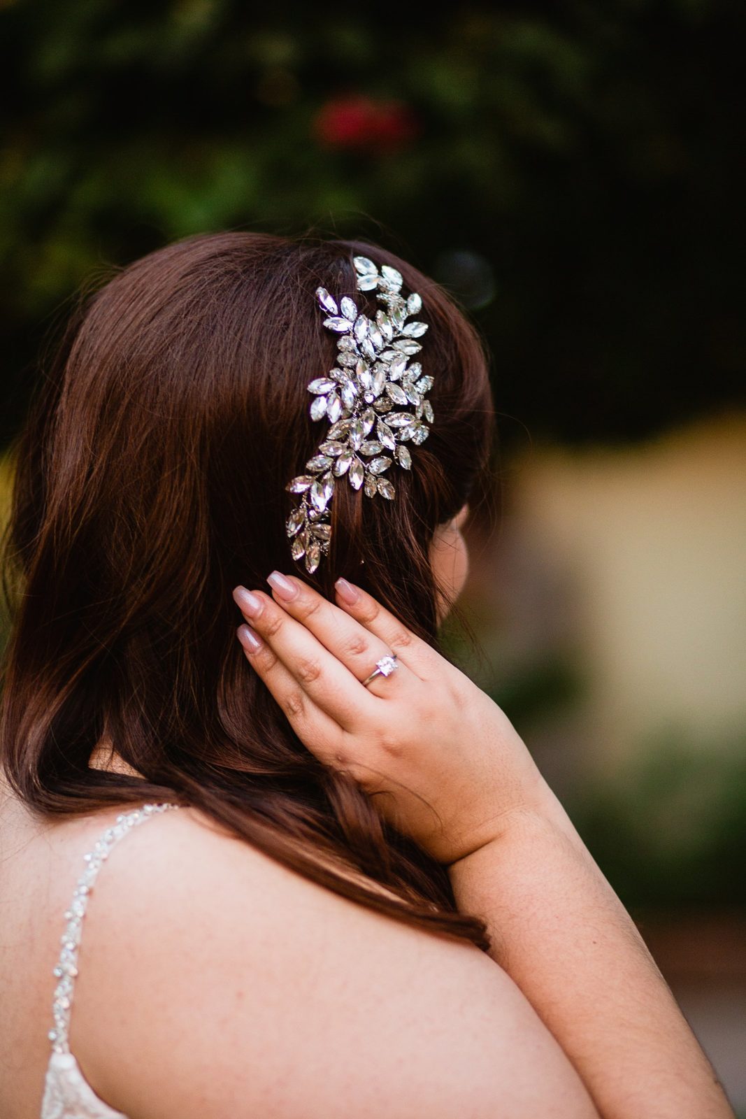 Bride's rhinestone garden inspired wedding hairpiece by PMA Photography.