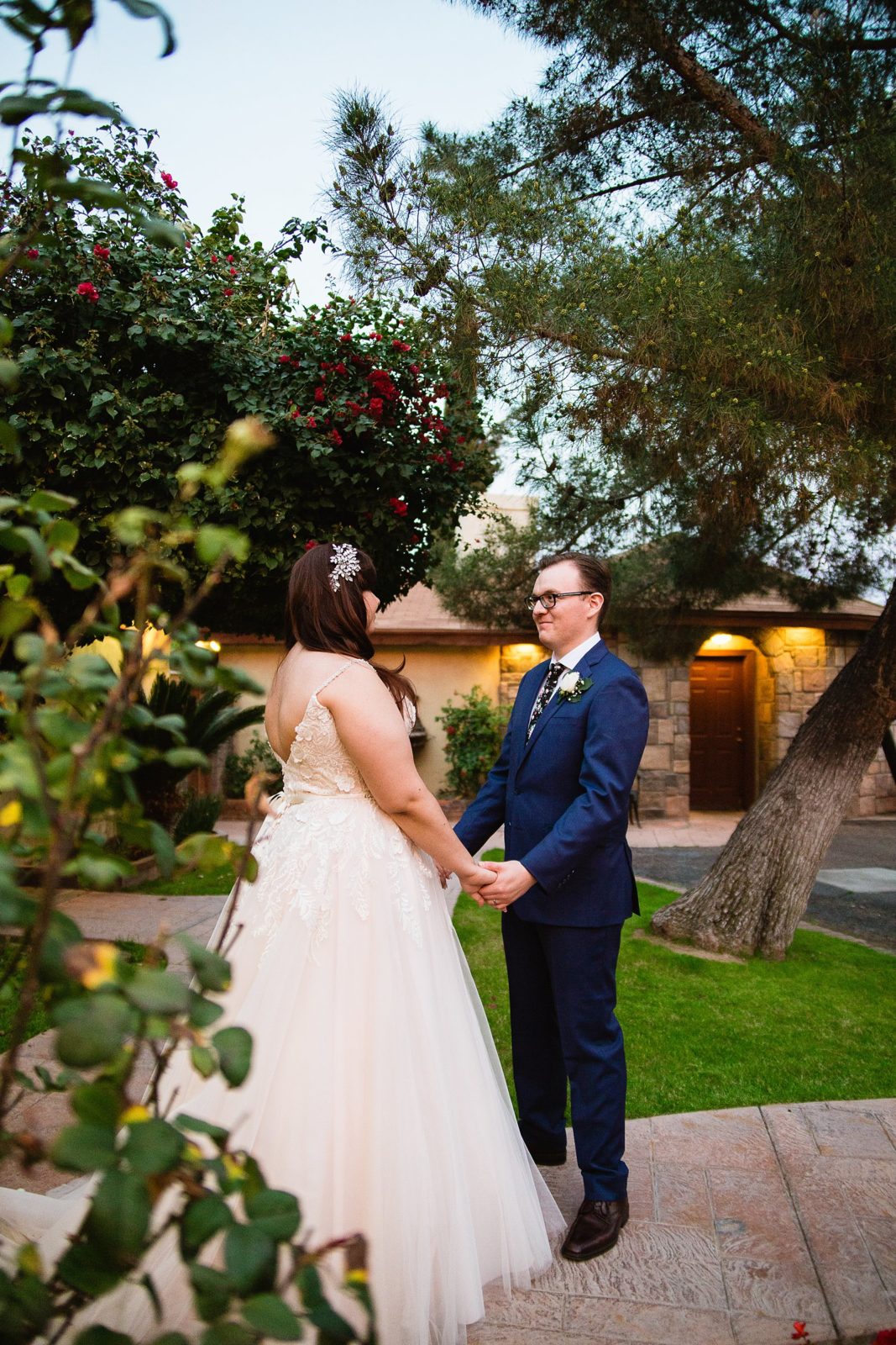 Bride and Groom pose for their Wright House Provencal wedding by Mesa wedding photographer PMA Photography.