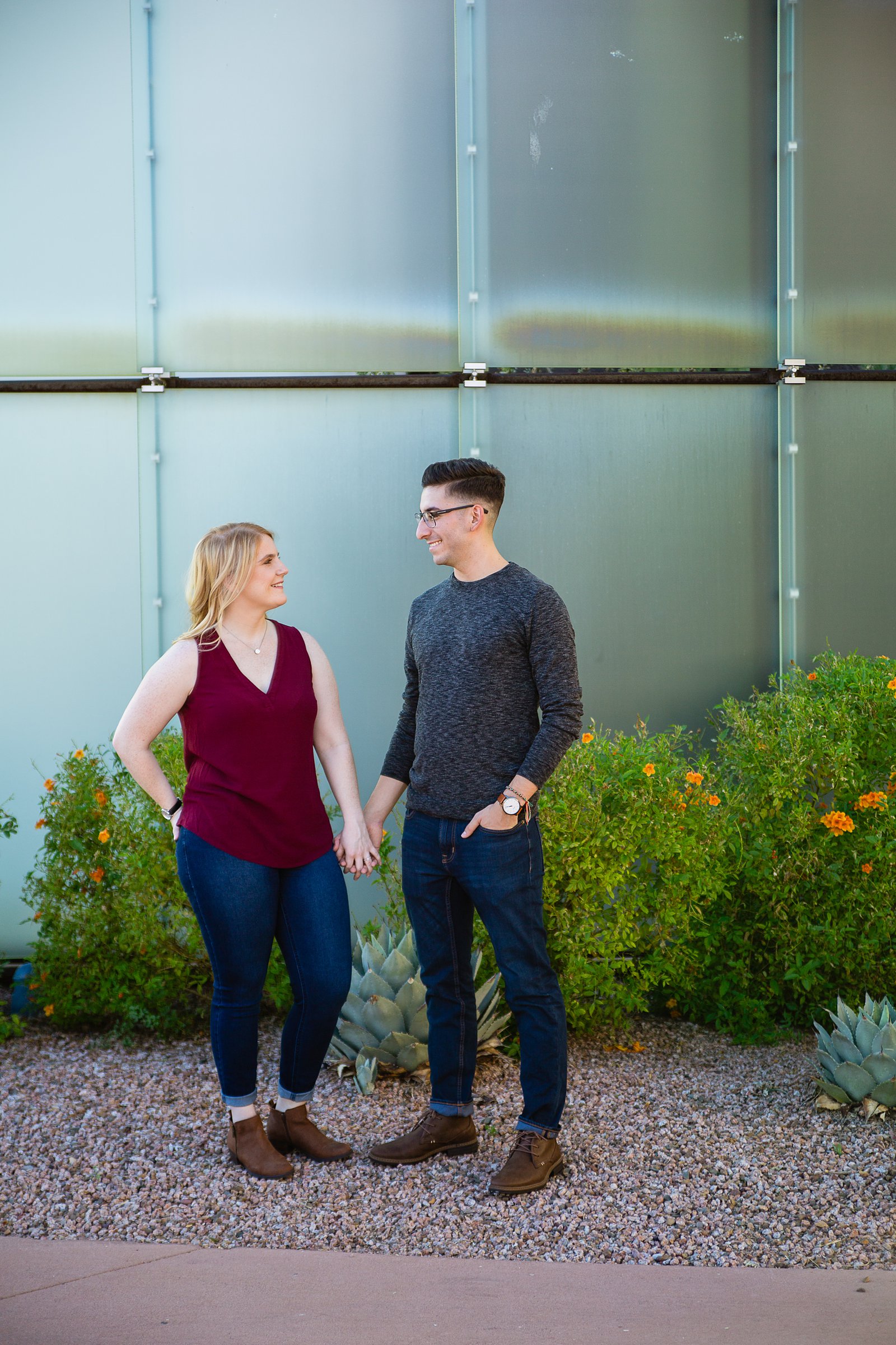 Couple pose for their Scottsdale Civic Center engagement session by Scottsdale wedding photographer PMA Photography.