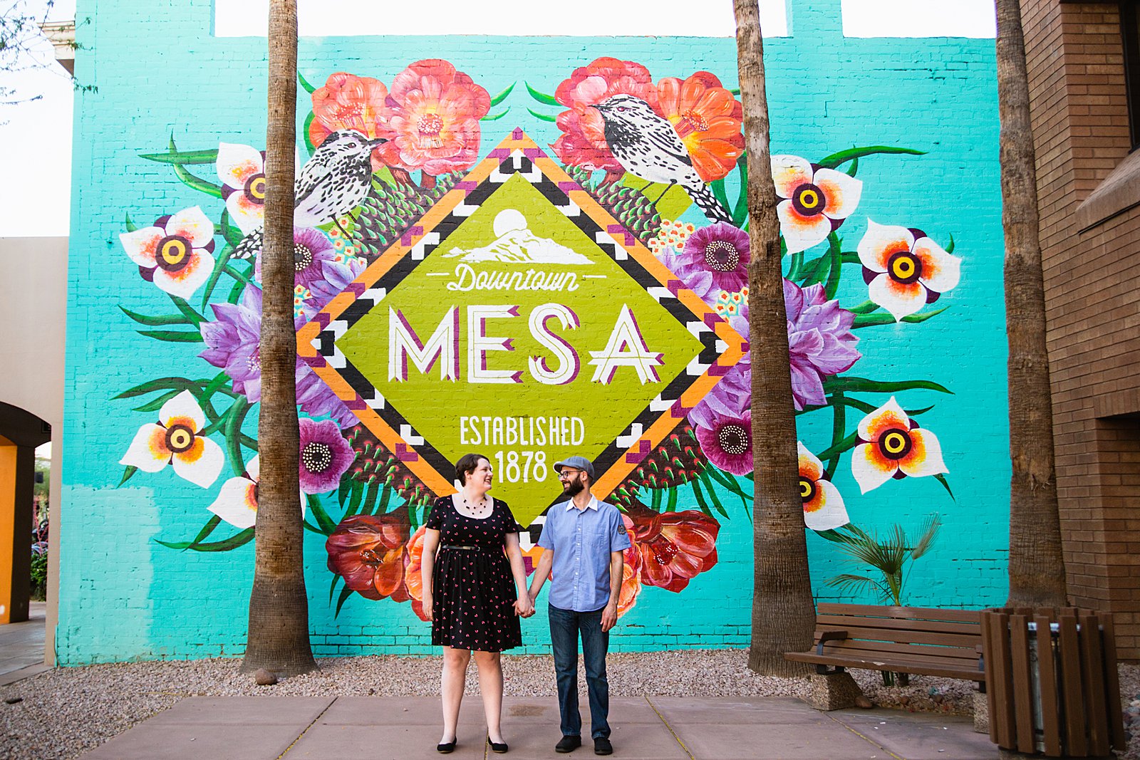 Couple pose for their Downtown Mesa engagement session by Phoenix wedding photographer PMA Photography.