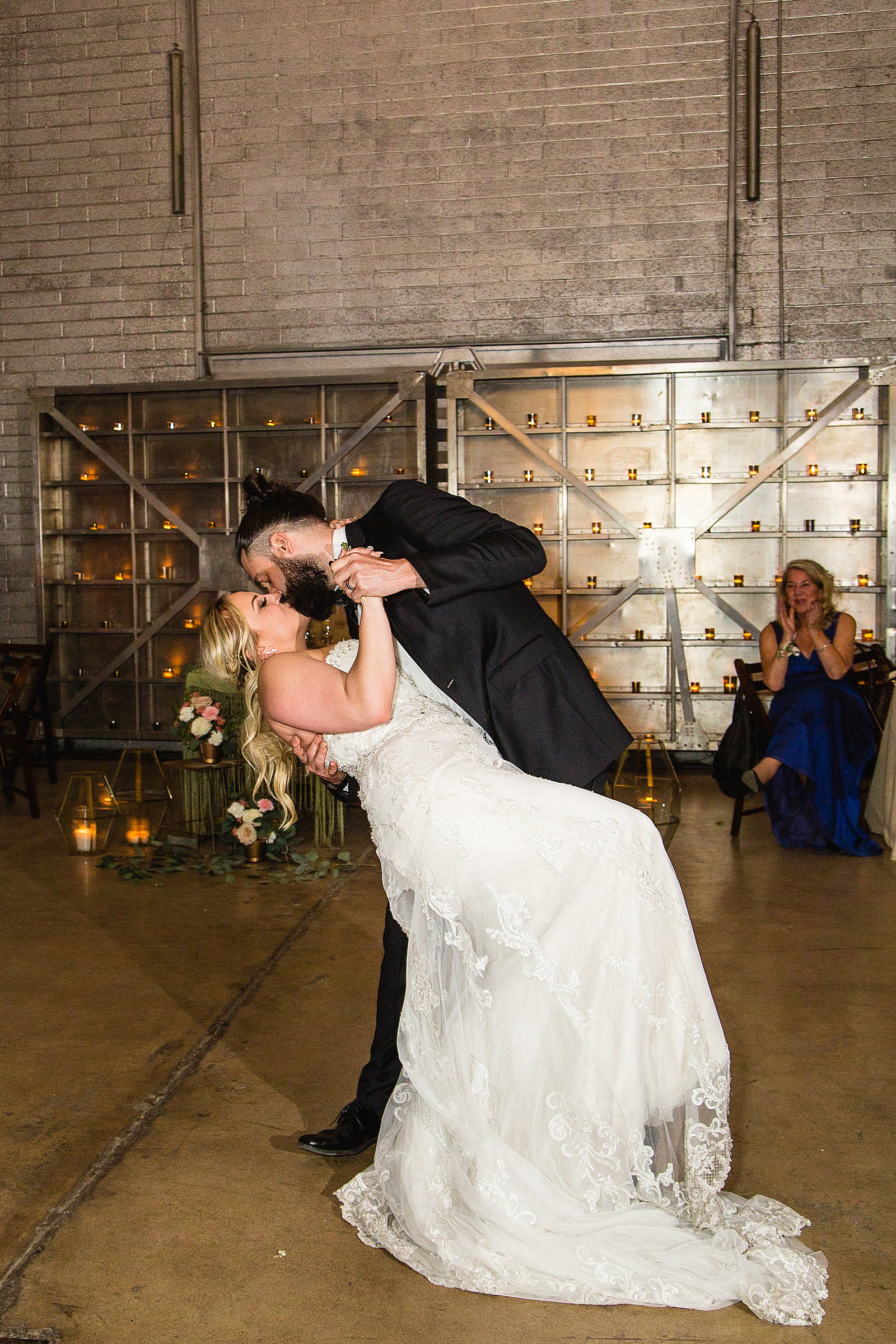 Bride and Groom sharing first dance at their The Ice House wedding reception by Arizona wedding photographer PMA Photography.