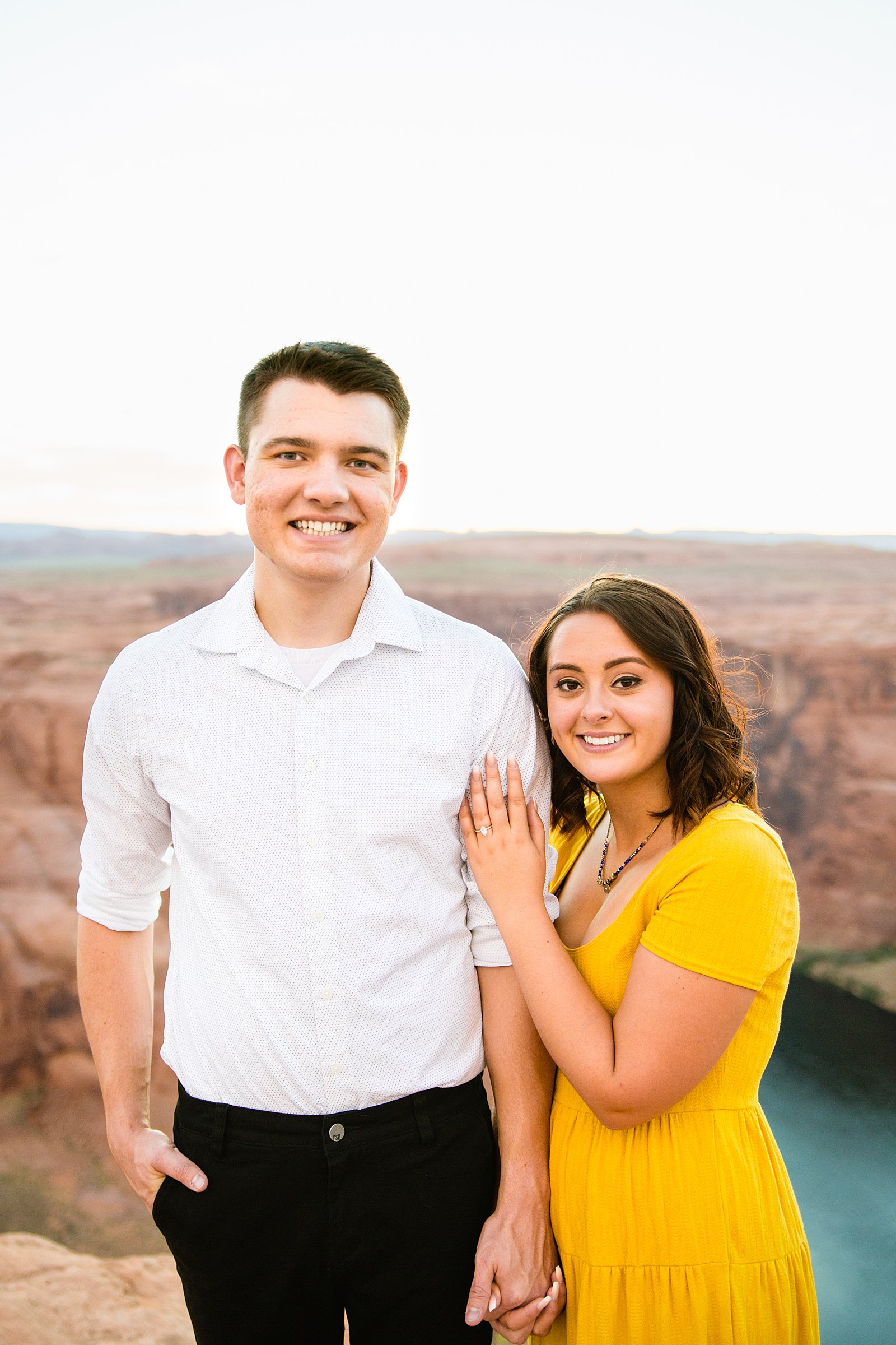 Couple pose during their Page engagement session by Arizona wedding photographer PMA Photography.