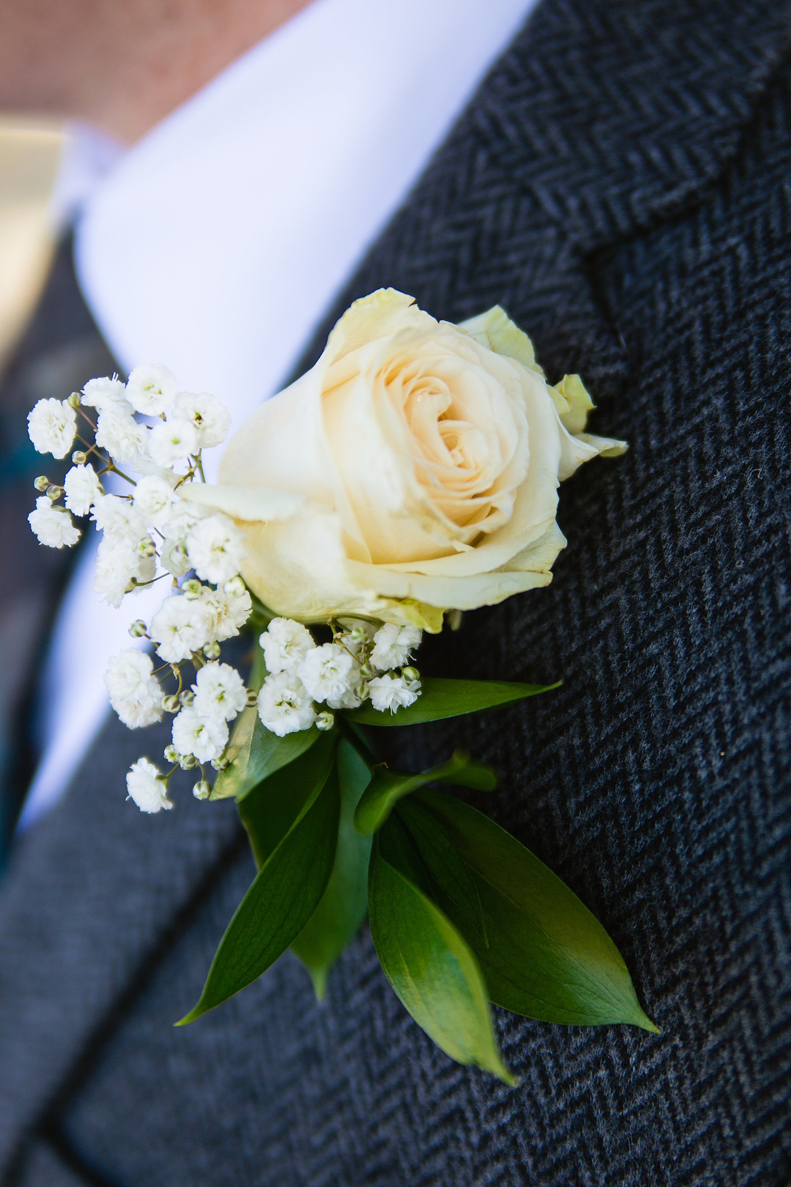 Groom's simple white rose DIY boutonniere by PMA Photography.