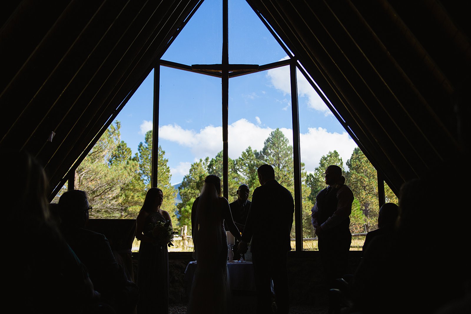Wedding ceremony at Chapel of the Holy Dove by Arizona wedding photographer PMA Photography.