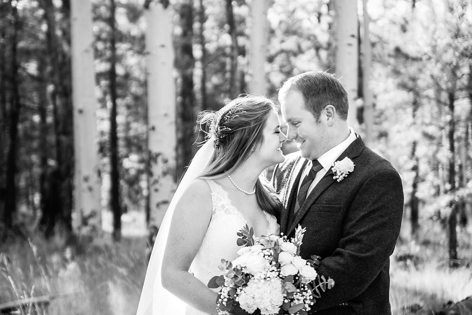 Bride and Groom share an intimate moment during their Chapel of the Holy Dove wedding by Flagstaff wedding photographer PMA Photography.