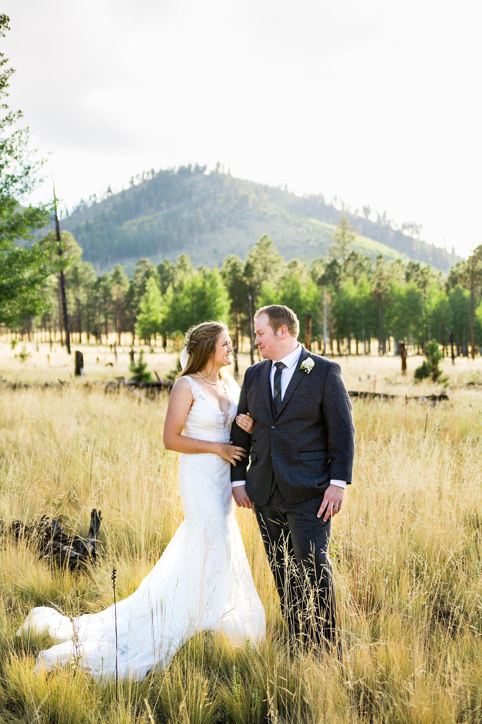Bride and Groom pose during their The Colton House wedding by Arizona wedding photographer PMA Photography.
