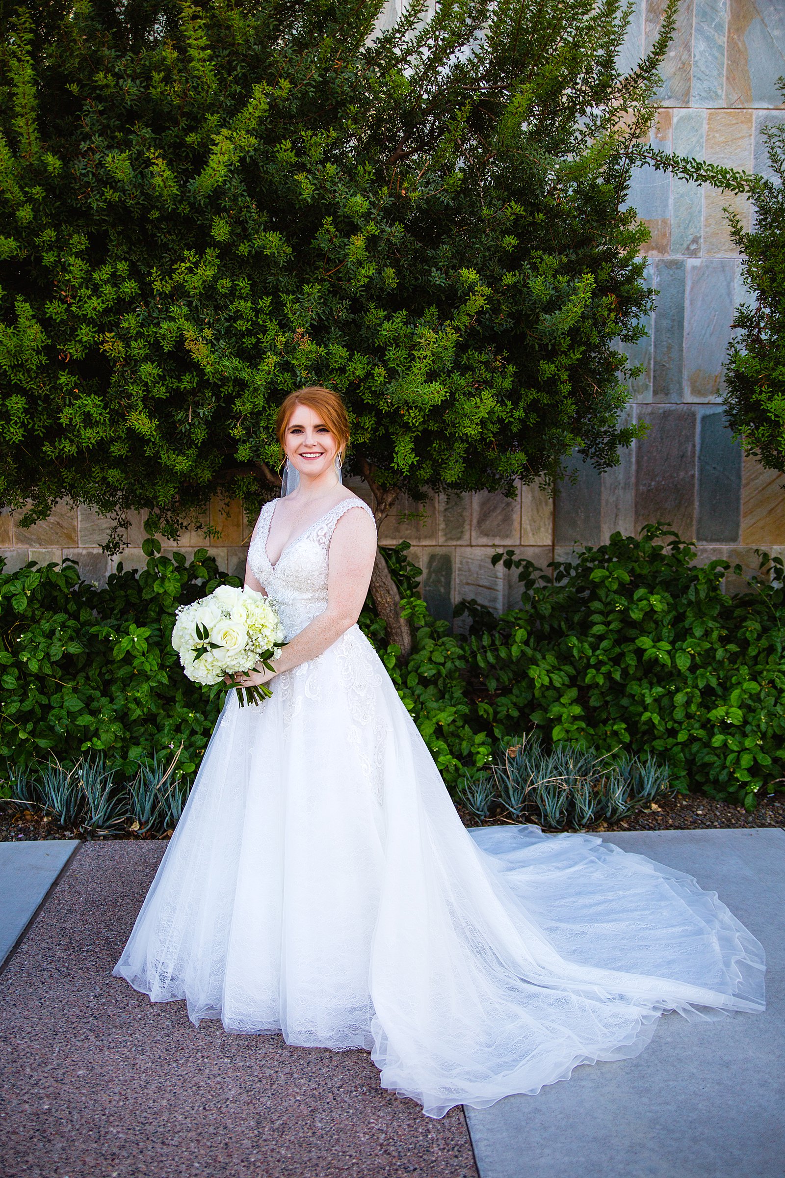 Bride's modern and romantic wedding dress for her SoHo63 wedding by PMA Photography.