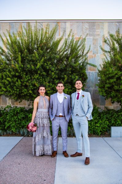 Groom and mixed gender bridal party together at a SoHo63 wedding by Arizona wedding photographer PMA Photography.