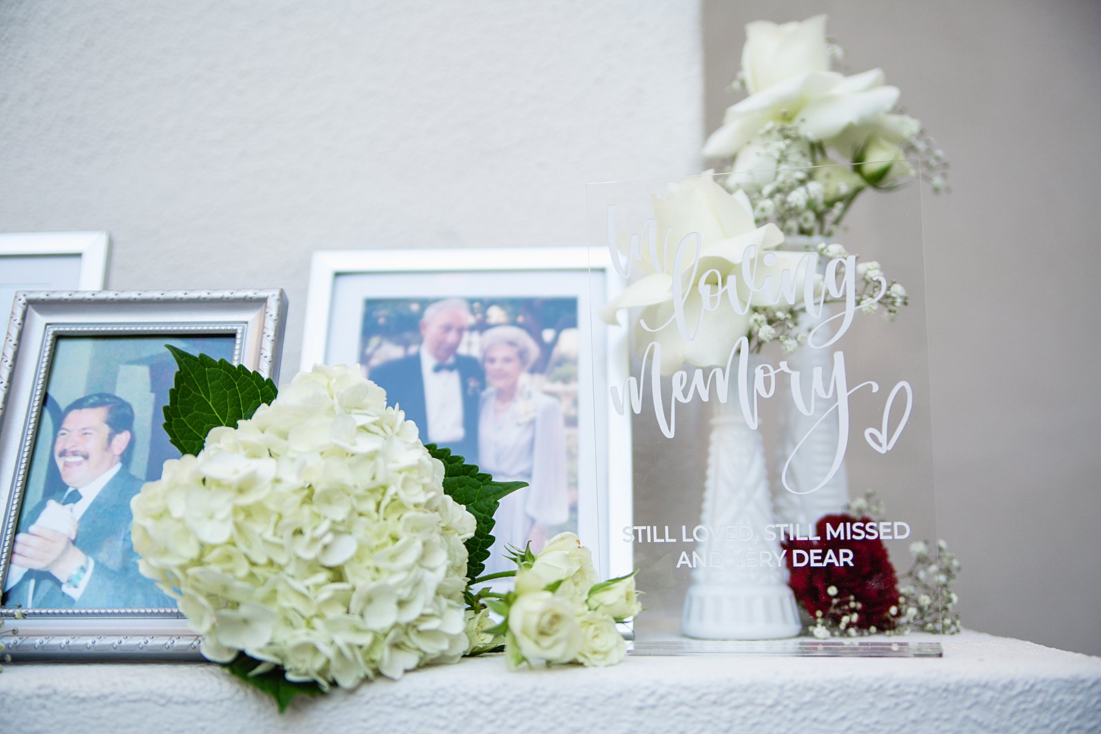 In loving memory mantle at SoHo63 wedding by Arizona wedding photographers PMA Photography.