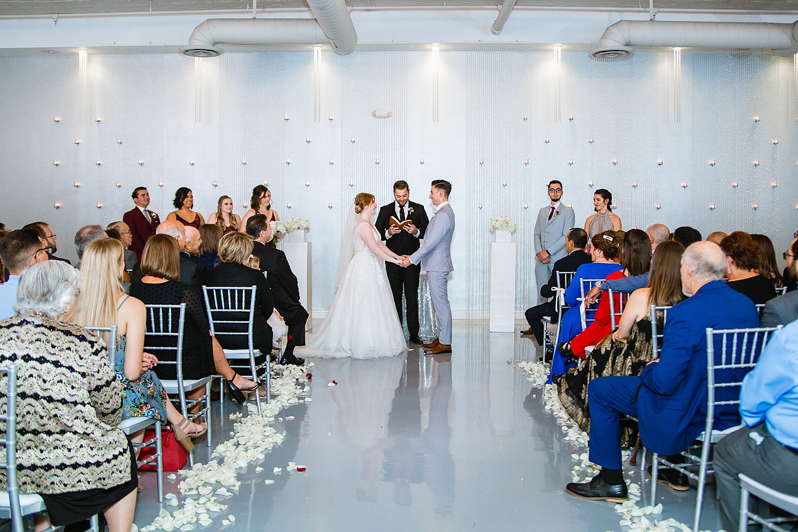 Wedding ceremony at SoHo63 by Phoenix wedding photographer PMA Photography.