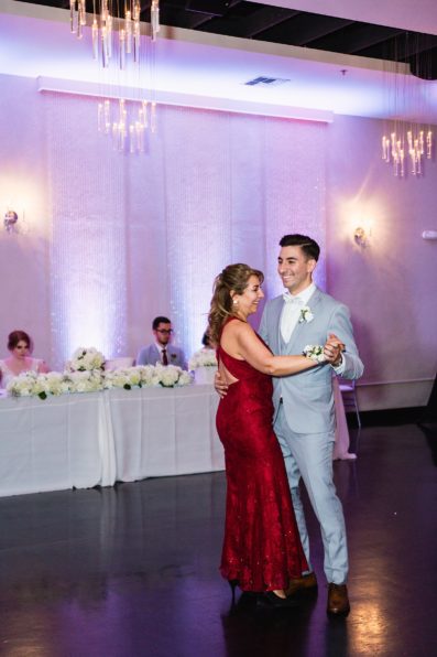 Mother son dance at SoHo63 wedding reception by Chandler wedding photographer PMA Photography