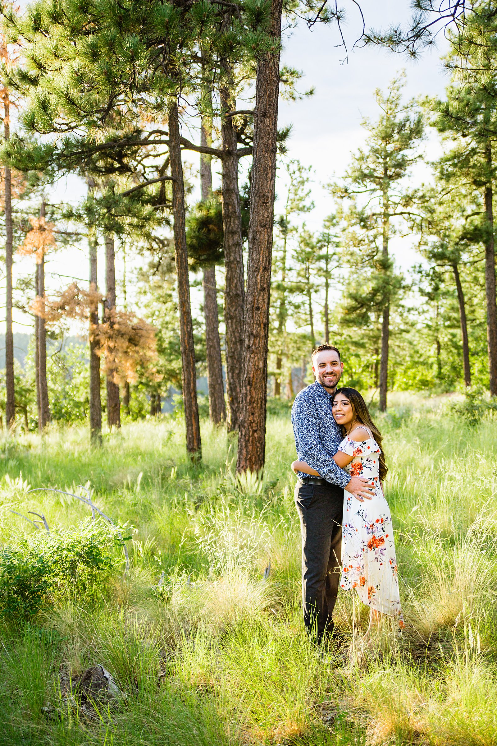 Couple pose for their Mogollon Rim engagement session by Payson wedding photographer PMA Photography.