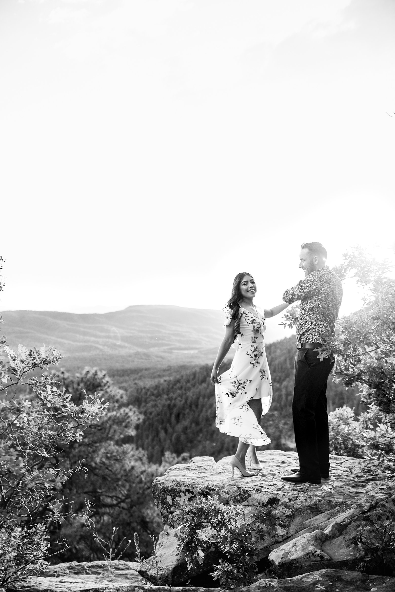 Couple dance together for their Mogollon Rim engagement session by Payson wedding photographer PMA Photography.